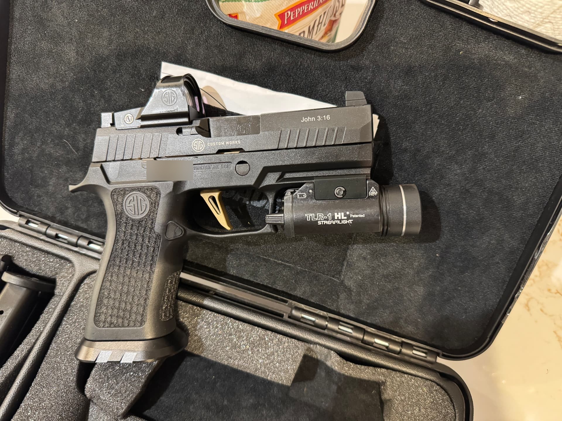 SIG Custom Works P320 with Romeo1Pro optic, weapon light and suppressor-height co-witness iron sights