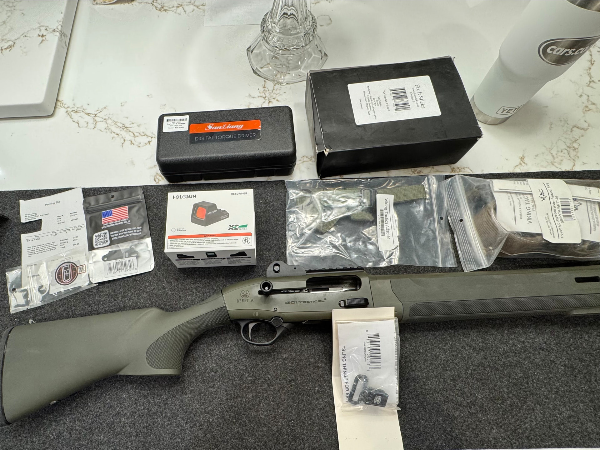 Beretta 1301 Tactical laid out with the Holosun 507K-GR, C&H mounting hardware, and installation tools
